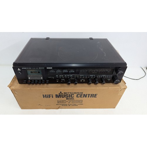 2049B - A MITSUBISHI HI-FI MUSIC CENTRE, MODEL MC-7500 WITH SPEAKERS
A 1970s Japanese-made stereo music syst... 