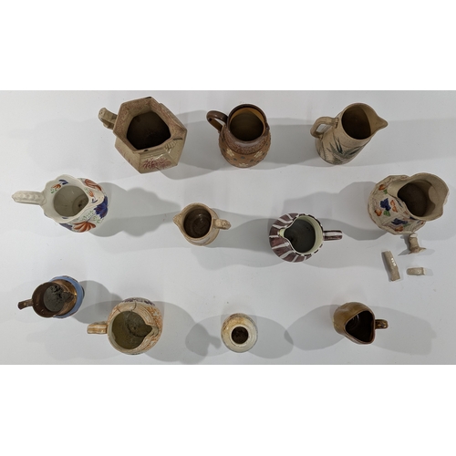 113 - Antique & Vintage Ceramic Jugs and Pitchers – A varied group of creamers, small jugs and water pitch... 