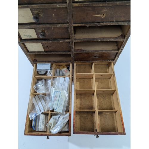 123 - Vintage Watchmaker’s Parts Cabinet w/ Contents

Early–mid 20th century wooden watchmaker’s cabinet w... 