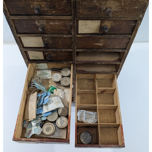 123 - Vintage Watchmaker’s Parts Cabinet w/ Contents

Early–mid 20th century wooden watchmaker’s cabinet w... 