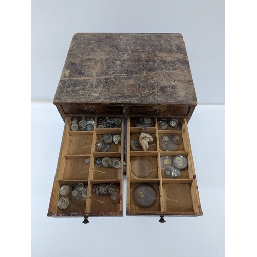 123 - Vintage Watchmaker’s Parts Cabinet w/ Contents

Early–mid 20th century wooden watchmaker’s cabinet w... 
