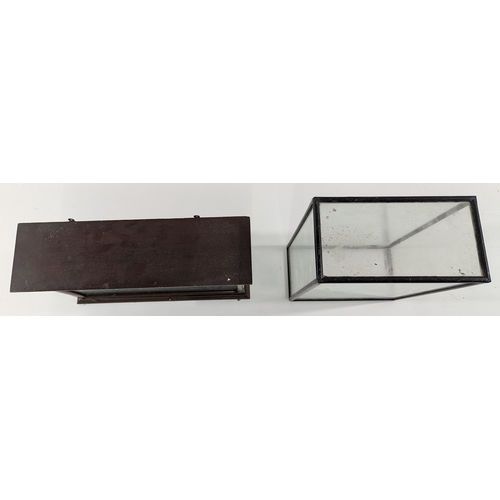 132 - Pair of Vintage Display Cases

Includes 1 wooden–framed glass display case with fitted top (wall-mou... 