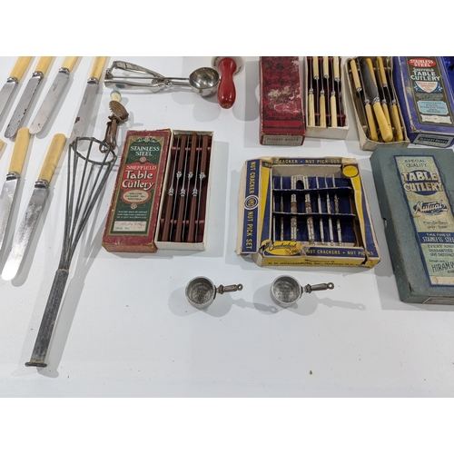 138 - Large Collection of Vintage Cutlery & Kitchen Implements.
An assorted lot including numerous boxed a... 