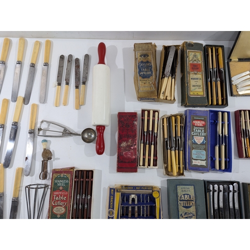 138 - Large Collection of Vintage Cutlery & Kitchen Implements.
An assorted lot including numerous boxed a... 
