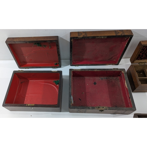 150 - Assorted antique wooden boxes, varying in size and design, including plain and carved examples. Some... 