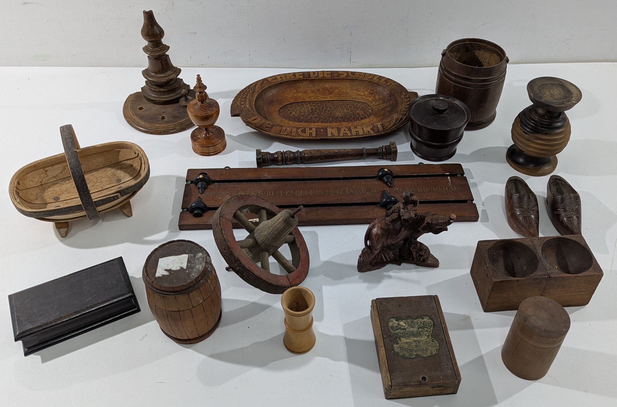A varied group of antique wooden items, including treenware, decorative ...