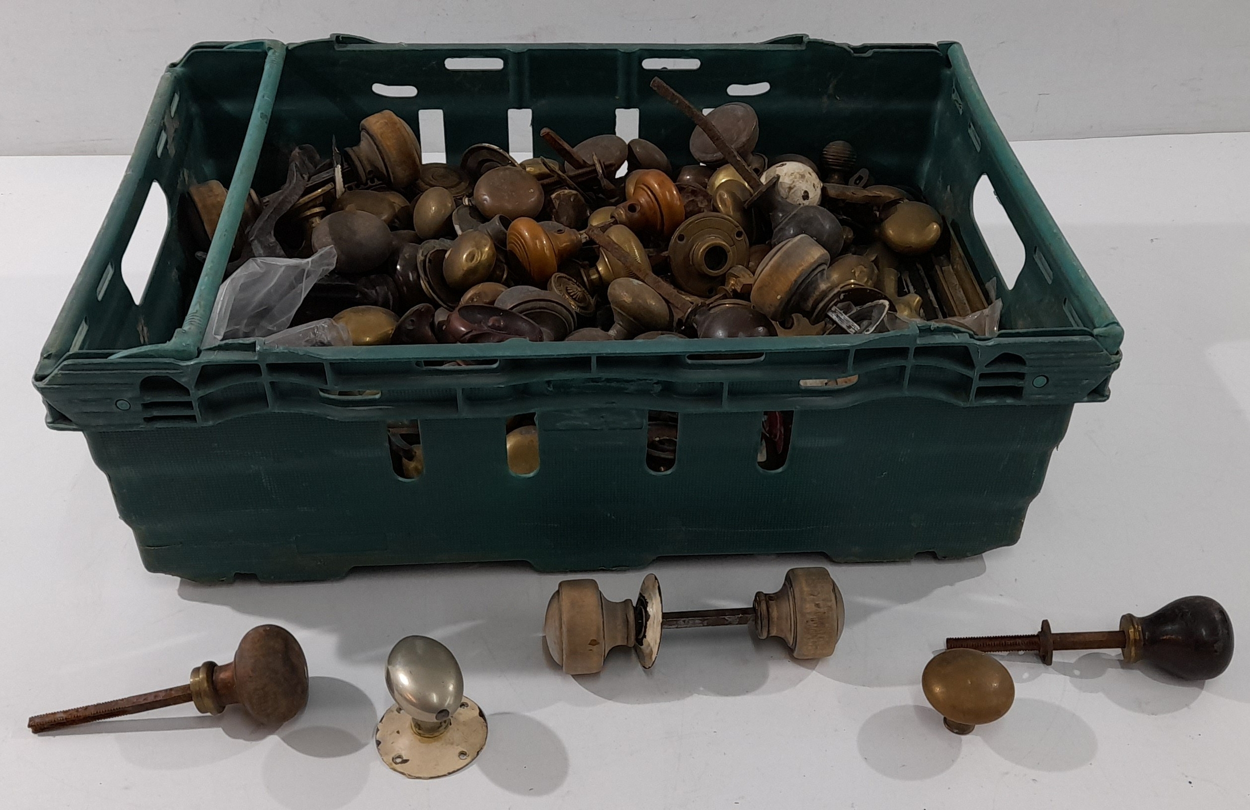 A large mixed lot of antique and vintage door furniture, comprising a ...