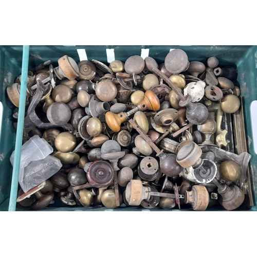 A large mixed lot of antique and vintage door furniture, comprising a ...
