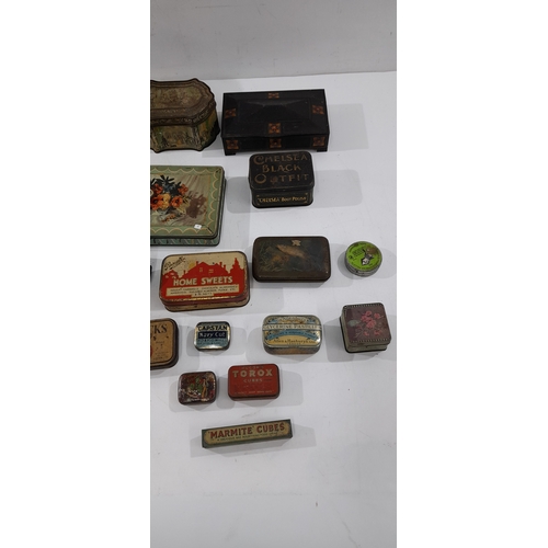 A collection of vintage and early 20th-century tins and boxes ...