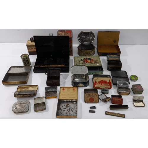 A collection of vintage and early 20th-century tins and boxes ...