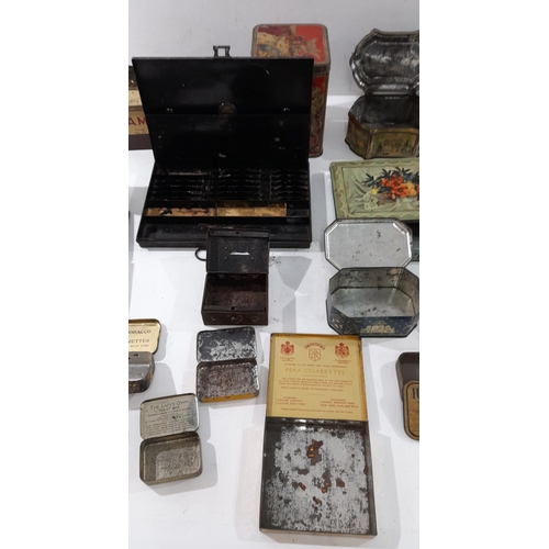 A collection of vintage and early 20th-century tins and boxes ...
