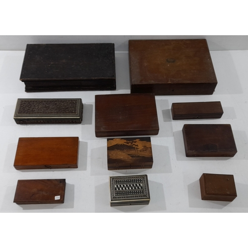 A collection of assorted antique and vintage wooden boxes and cases, in ...
