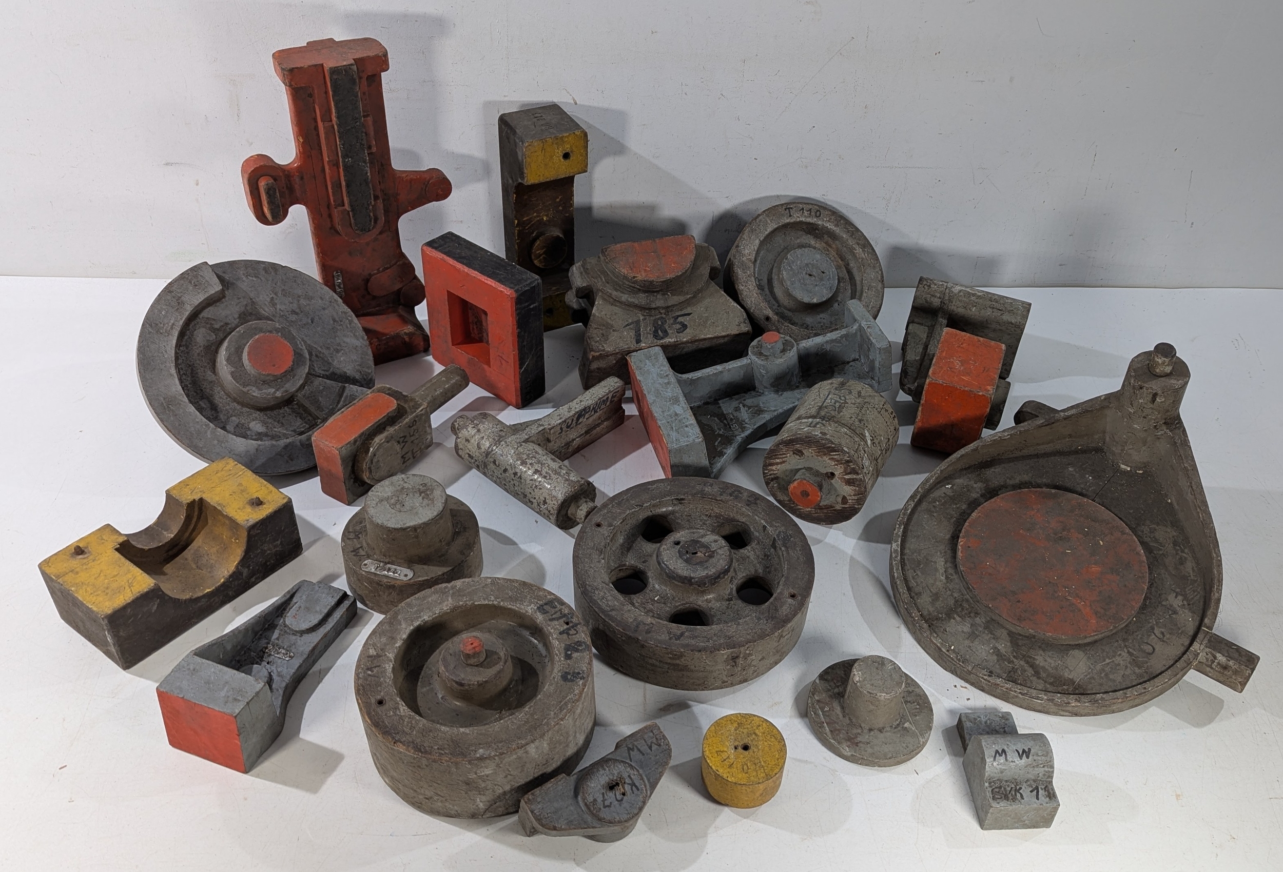 A mixed lot of industrial foundry patterns and tooling components ...