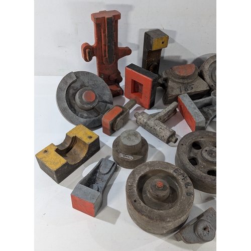 A mixed lot of industrial foundry patterns and tooling components ...