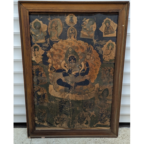 Tibetan School, Wrathful Deity in Yab-Yum, 20th century

Pigments on paper, depicting a blue-skinned wrathful deity seated in embrace within a flaming aureole, surrounded by attendant deities and figures; later framed.

80 cm high, 57 cm wide.

(Extensive creasing, tears, losses and surface wear; not examined out of frame.)