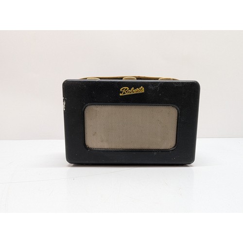 2492 - VINTAGE ROBERTS MODEL R200 TRANSISTOR RADIO
A Roberts Model R200 portable transistor radio, c.1960s,... 