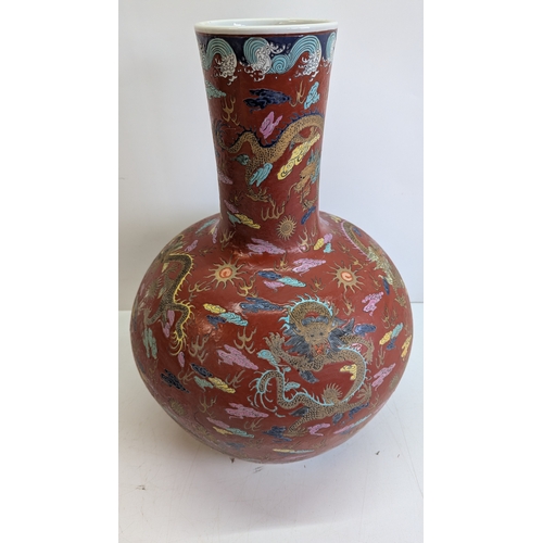 51 - Large Vintage Chinese-Style Polychrome Dragon Vase

A substantial decorative vase of globular form w... 