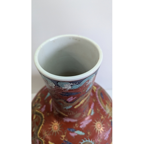 51 - Large Vintage Chinese-Style Polychrome Dragon Vase

A substantial decorative vase of globular form w... 