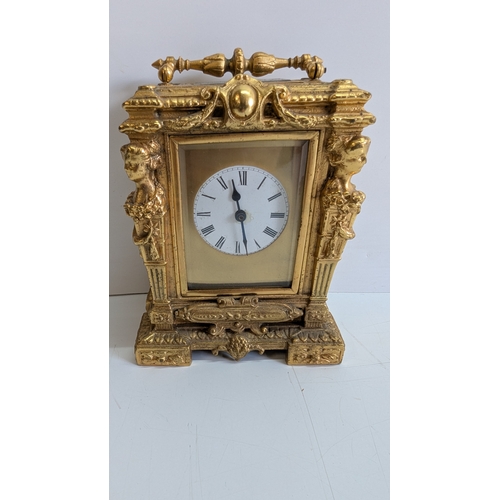 26 - Late 19th Century French Gilt Brass Caryatid Carriage Clock, Circa 1880–1900

Elaborately cast archi... 