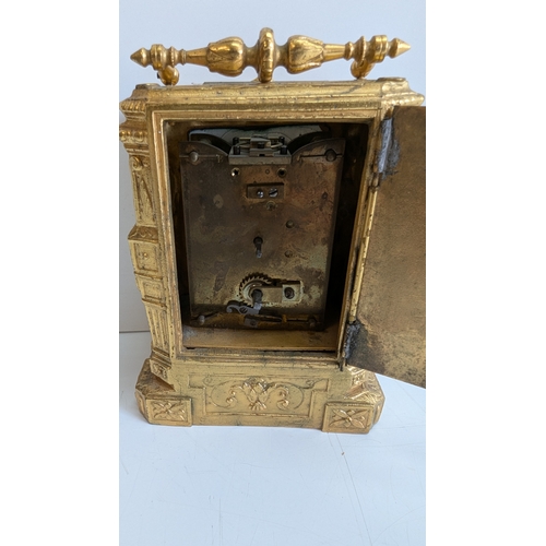 26 - Late 19th Century French Gilt Brass Caryatid Carriage Clock, Circa 1880–1900

Elaborately cast archi... 