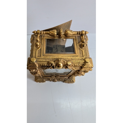 26 - Late 19th Century French Gilt Brass Caryatid Carriage Clock, Circa 1880–1900

Elaborately cast archi... 