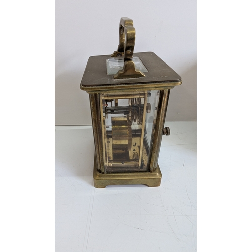 28 - Antique French Brass Four-Glass Carriage Clock with Original Travelling Case

White enamel dial with... 