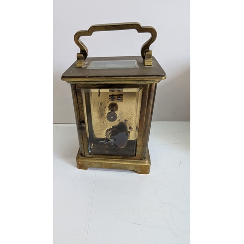 28 - Antique French Brass Four-Glass Carriage Clock with Original Travelling Case

White enamel dial with... 