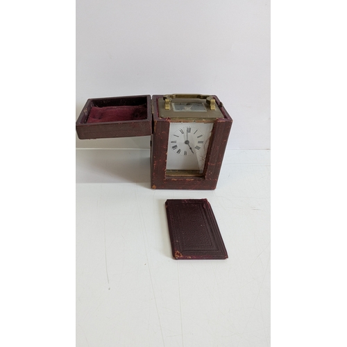 28 - Antique French Brass Four-Glass Carriage Clock with Original Travelling Case

White enamel dial with... 