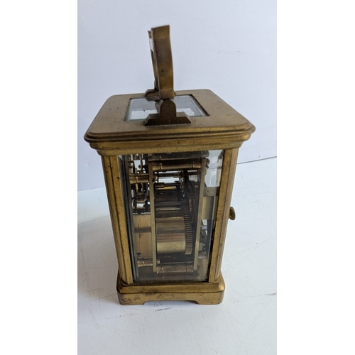 29 - Antique French Brass Four-Glass Carriage Clock with Travelling Case & Key

White enamel dial with Ro... 