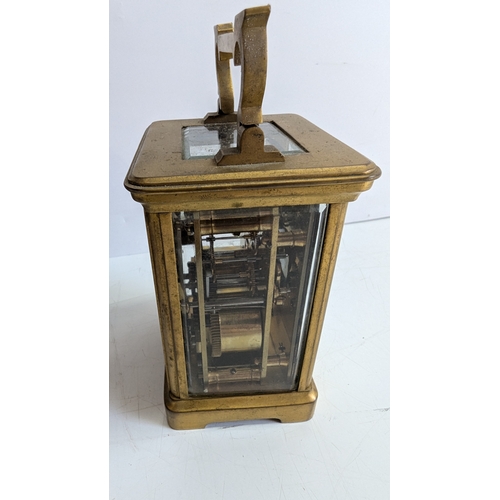 29 - Antique French Brass Four-Glass Carriage Clock with Travelling Case & Key

White enamel dial with Ro... 