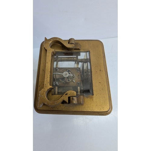 29 - Antique French Brass Four-Glass Carriage Clock with Travelling Case & Key

White enamel dial with Ro... 