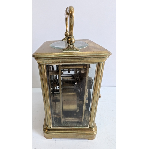 30 - Antique Brass Four-Glass Carriage Clock with Key

White enamel dial with Roman numerals and black ha... 