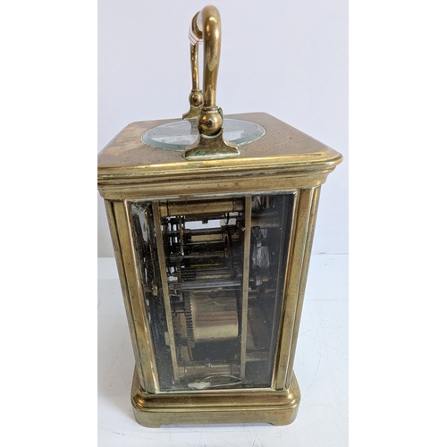 30 - Antique Brass Four-Glass Carriage Clock with Key

White enamel dial with Roman numerals and black ha... 