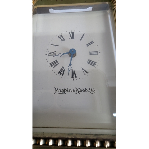 31 - Mappin & Webb Ltd Brass Four-Glass Carriage Clock

White dial signed Mappin & Webb Ltd, with Roman n... 