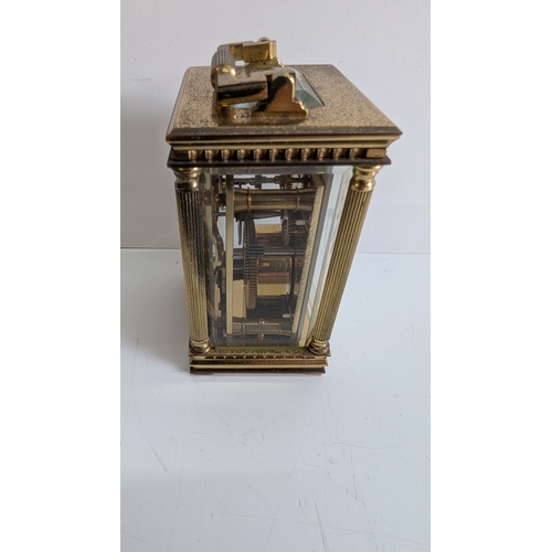 31 - Mappin & Webb Ltd Brass Four-Glass Carriage Clock

White dial signed Mappin & Webb Ltd, with Roman n... 