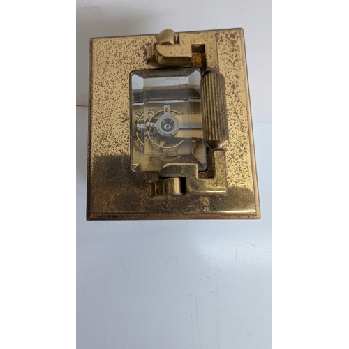 31 - Mappin & Webb Ltd Brass Four-Glass Carriage Clock

White dial signed Mappin & Webb Ltd, with Roman n... 