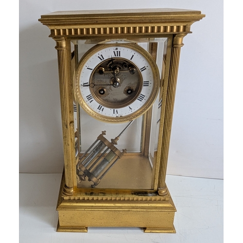 32 - Antique French Four-Glass Striking Mantel Clock with Mercury Pendulum

Architectural gilt-brass case... 
