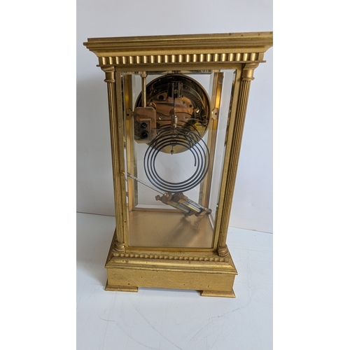 32 - Antique French Four-Glass Striking Mantel Clock with Mercury Pendulum

Architectural gilt-brass case... 