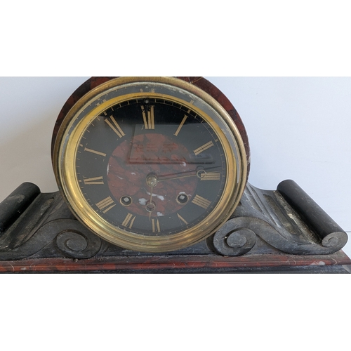 34 - Antique French Black & Rouge Marble Striking Mantel Clock

Black chapter ring with gilt Roman numera... 