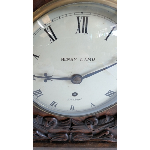 35 - Antique Henry Lamb London Carved Mahogany Mantel Clock

Cream dial signed Henry Lamb, London, with R... 