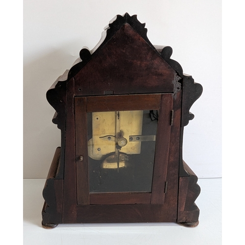 35 - Antique Henry Lamb London Carved Mahogany Mantel Clock

Cream dial signed Henry Lamb, London, with R... 