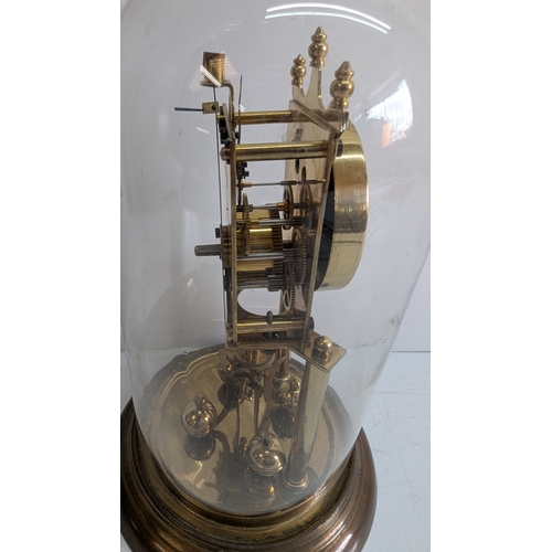 37 - Antique Brass Four-Glass Anniversary Torsion Clock Under Glass Dome

Porcelain dial with Arabic nume... 