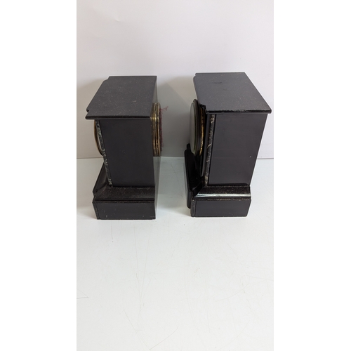 38 - Pair of Antique Black Slate & Marble Mantel Clocks

Two late 19th-century architectural mantel clock... 
