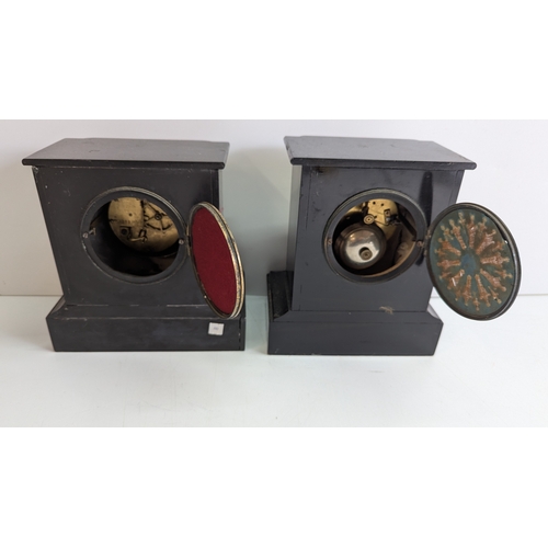 38 - Pair of Antique Black Slate & Marble Mantel Clocks

Two late 19th-century architectural mantel clock... 