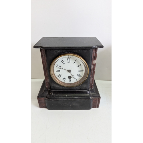 39 - Two Antique Black Slate Mantel Clocks, One by Chas. Frodsham

One clock with red marble inset pilast... 