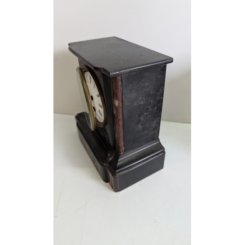 39 - Two Antique Black Slate Mantel Clocks, One by Chas. Frodsham

One clock with red marble inset pilast... 