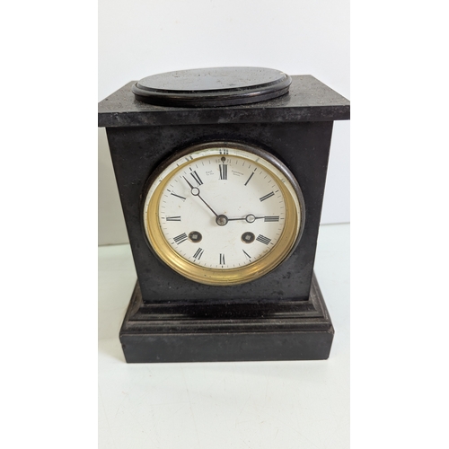 39 - Two Antique Black Slate Mantel Clocks, One by Chas. Frodsham

One clock with red marble inset pilast... 