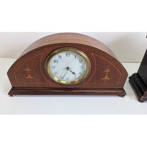 40 - Two Antique Inlaid Mahogany Mantel Clocks

Both with shaped architectural cases, decorative boxwood ... 