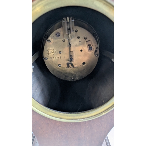 41 - Two Antique Mahogany Balloon Mantel Clocks

The larger example has a white enamel Roman numeral dial... 