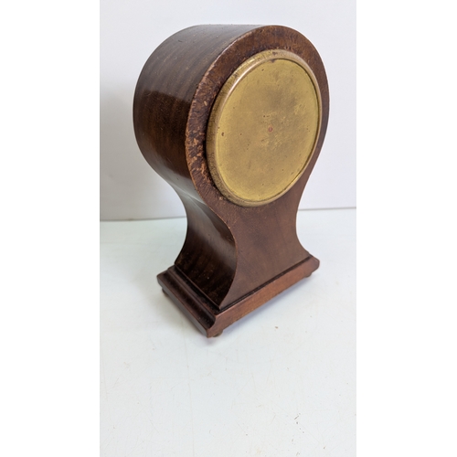 41 - Two Antique Mahogany Balloon Mantel Clocks

The larger example has a white enamel Roman numeral dial... 